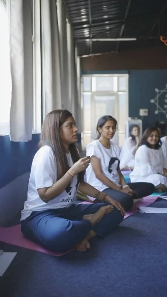 Seekers sitting together in a sadhana session