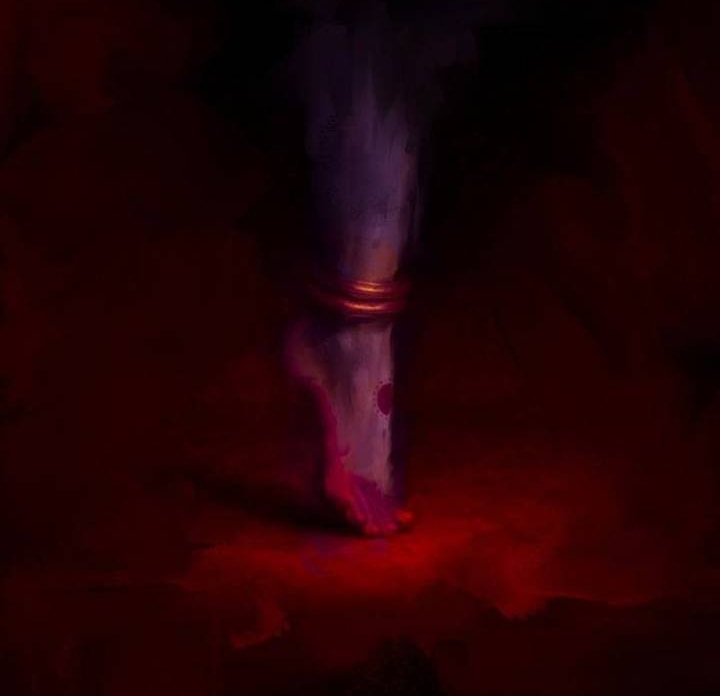 A ceremonial flame in a dark setting